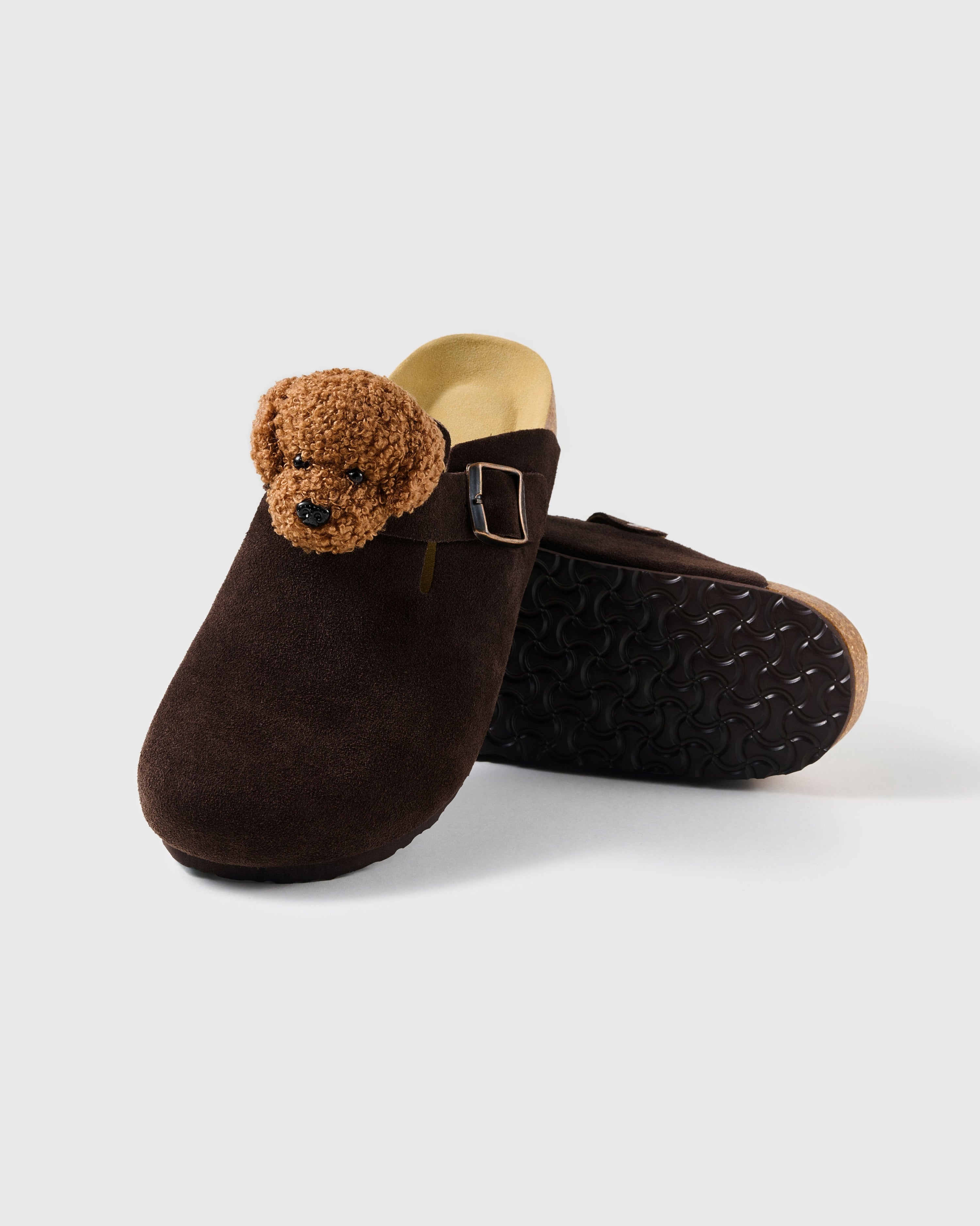 STICKYZOO chocolate-brown suede clogs with a medium brown curly plush poodle face, closed toe, and adjustable buckle strap