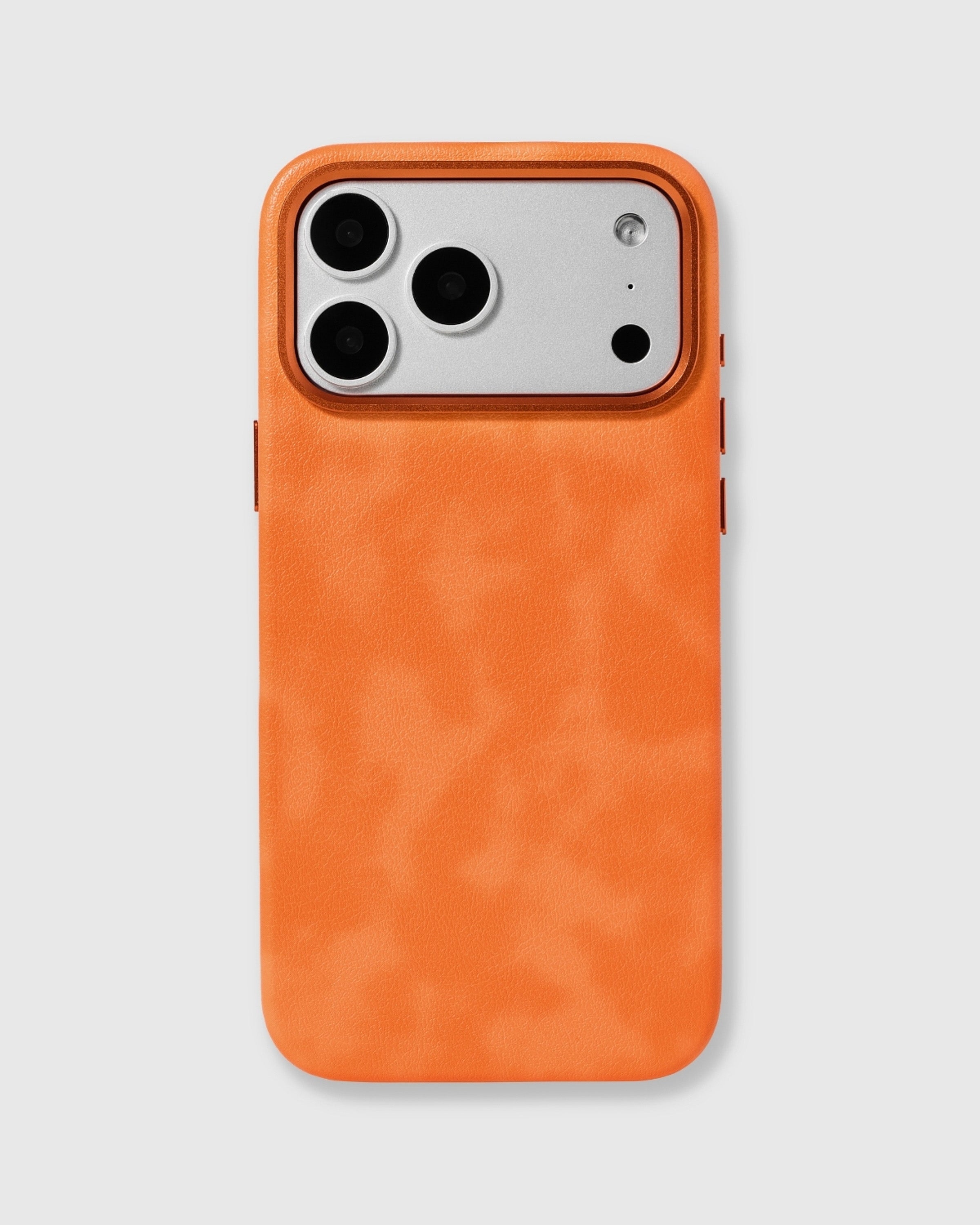 STICKYZOO orange Heritage Leather Case with a bright orange textured vegan leather surface and raised metal camera edge