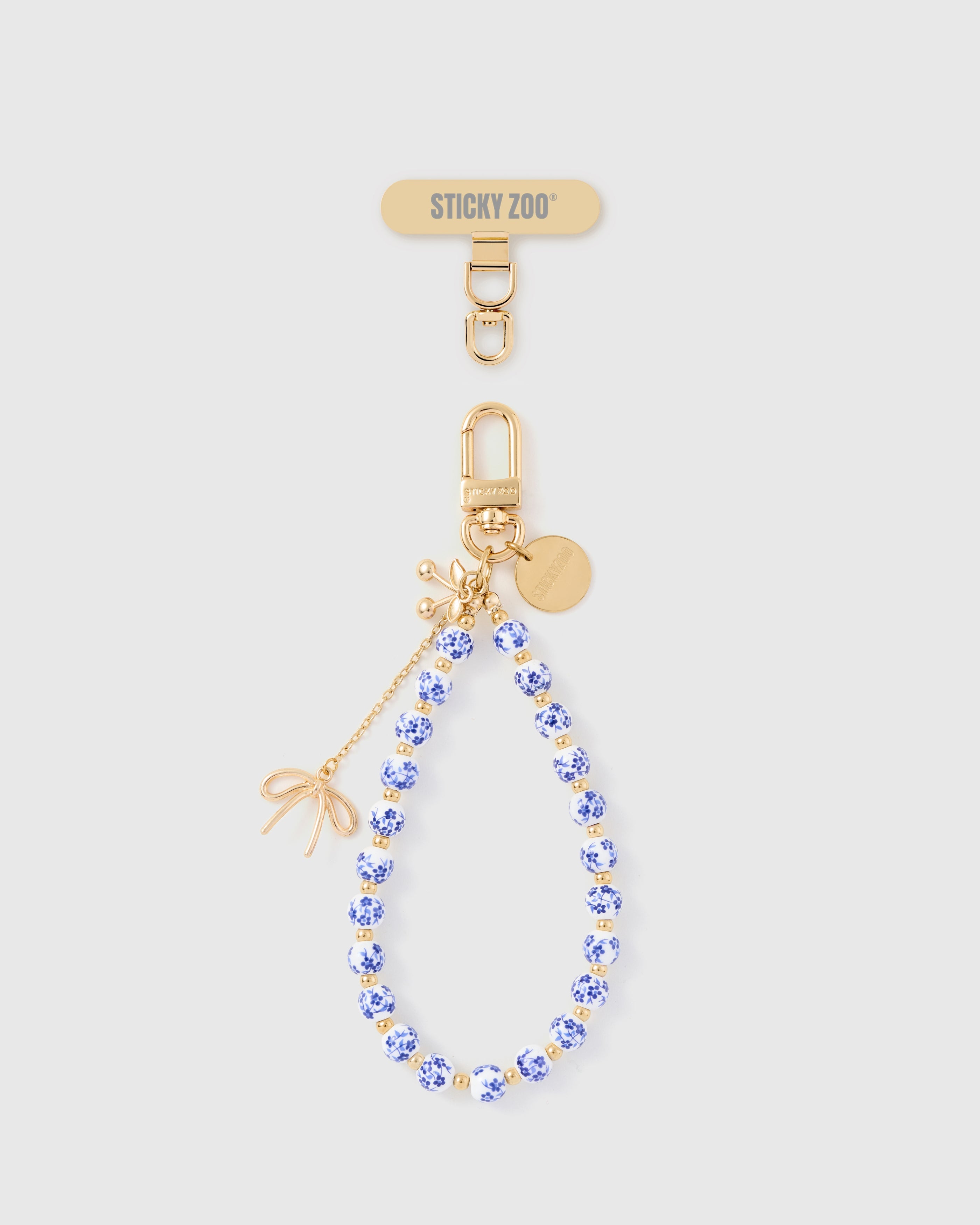 PORCELAIN BLOOM CHARM PHONE STRAP