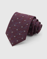 STICKYZOO Claret Four-Dot Tie in claret and burgundy silk, rolled to show claret crosshatch with white four-dot clusters across the blade.