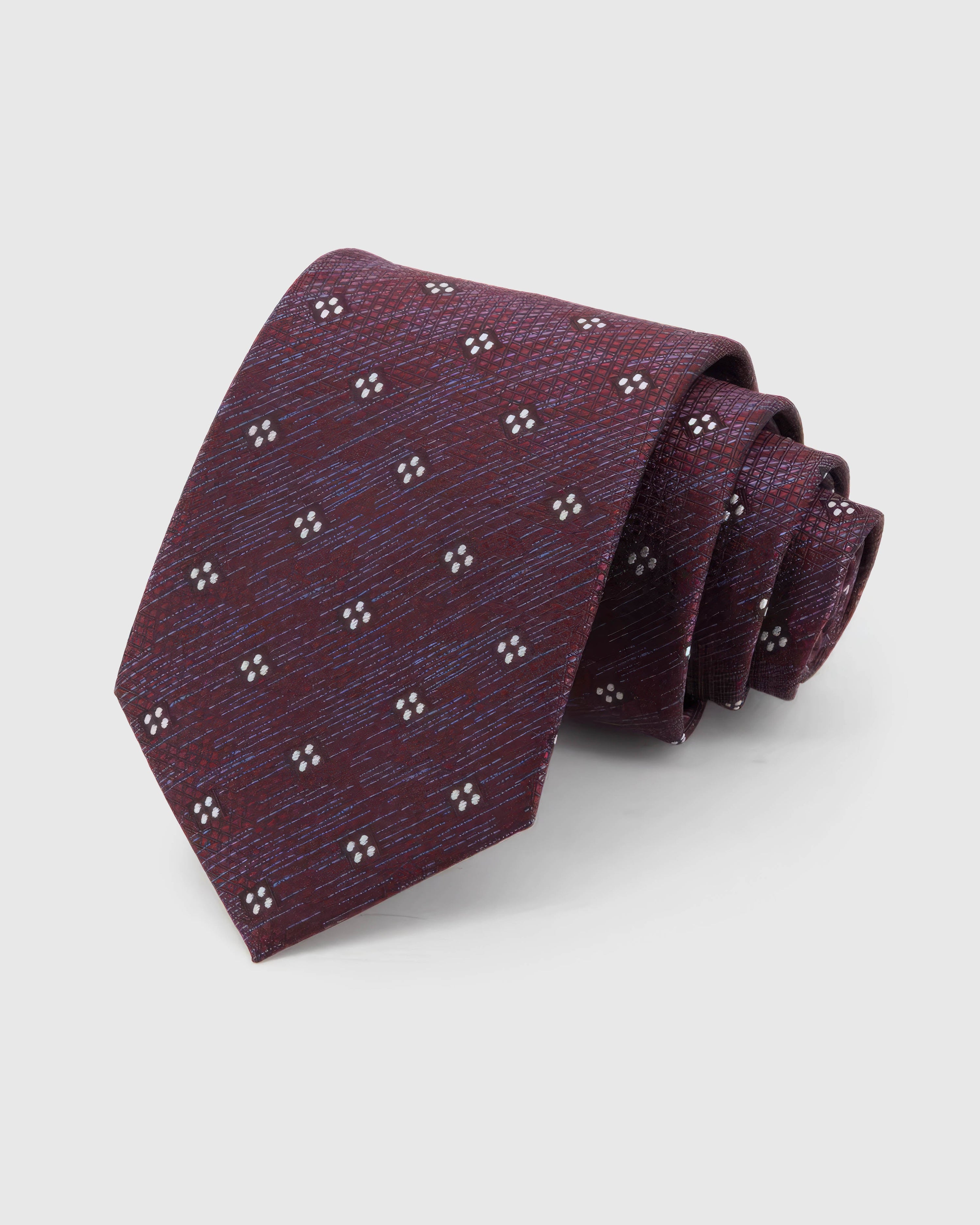 STICKYZOO Claret Four-Dot Tie in claret and burgundy silk, rolled to show claret crosshatch with white four-dot clusters across the blade.