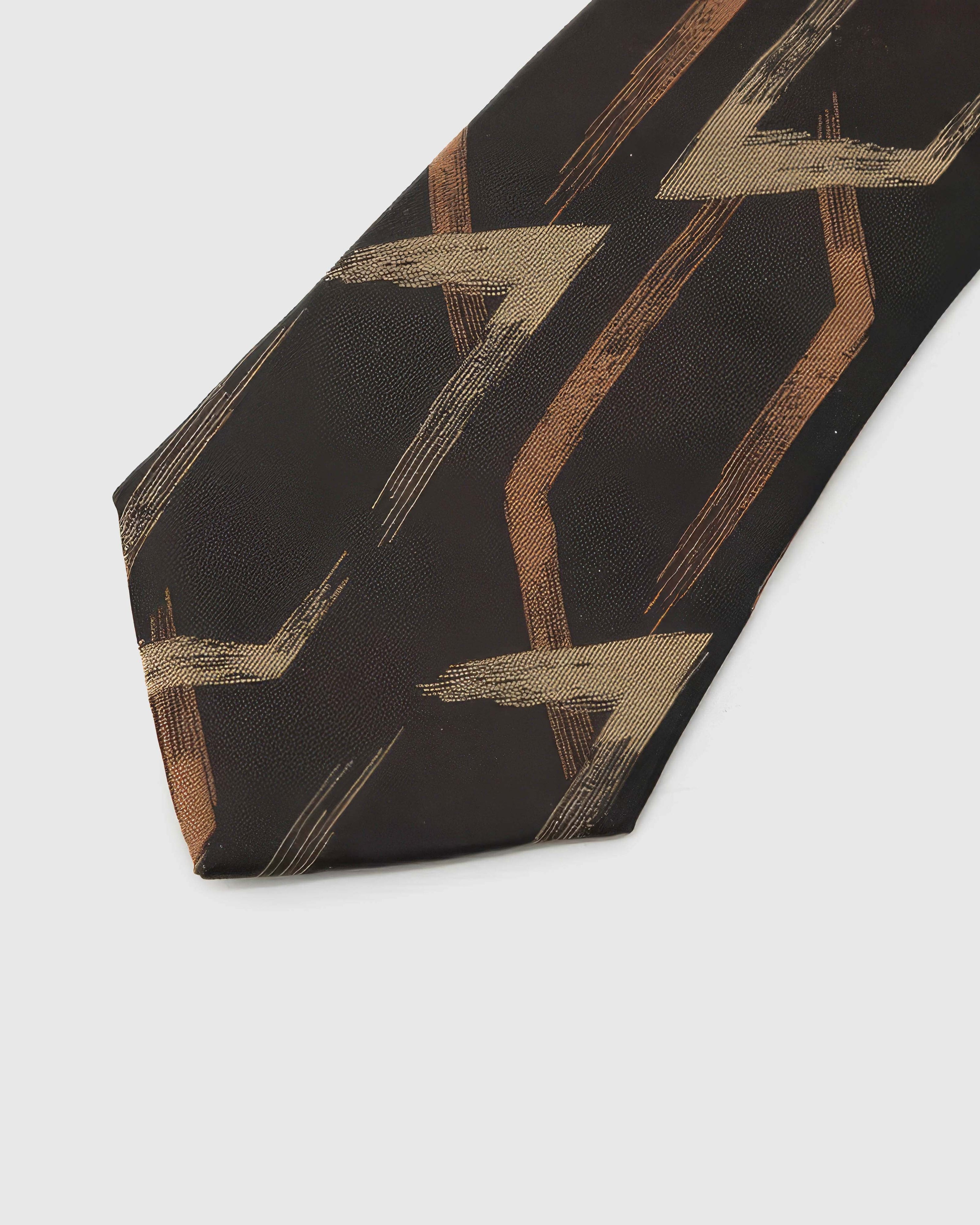 Copper-brass arrows across obsidian-espresso silk, hand-embroidered with raised thread by STICKYZOO