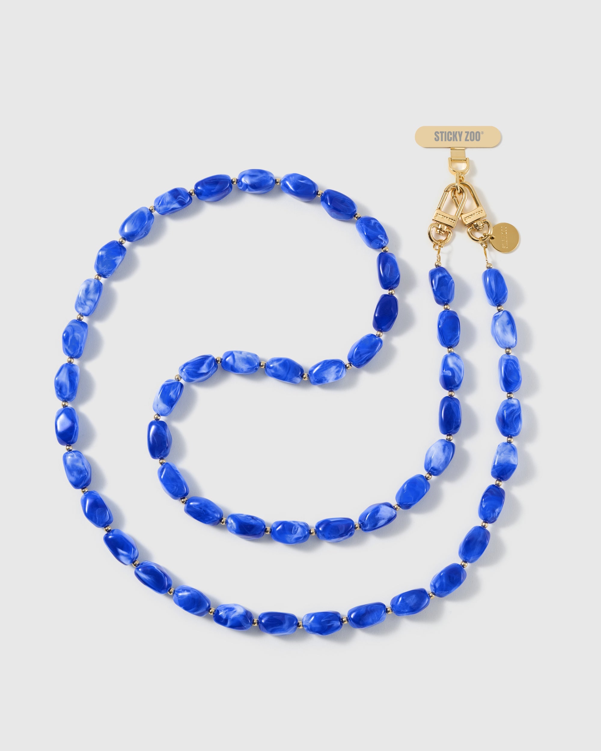 COBALT ORBIT CROSS-BODY PHONE STRAP