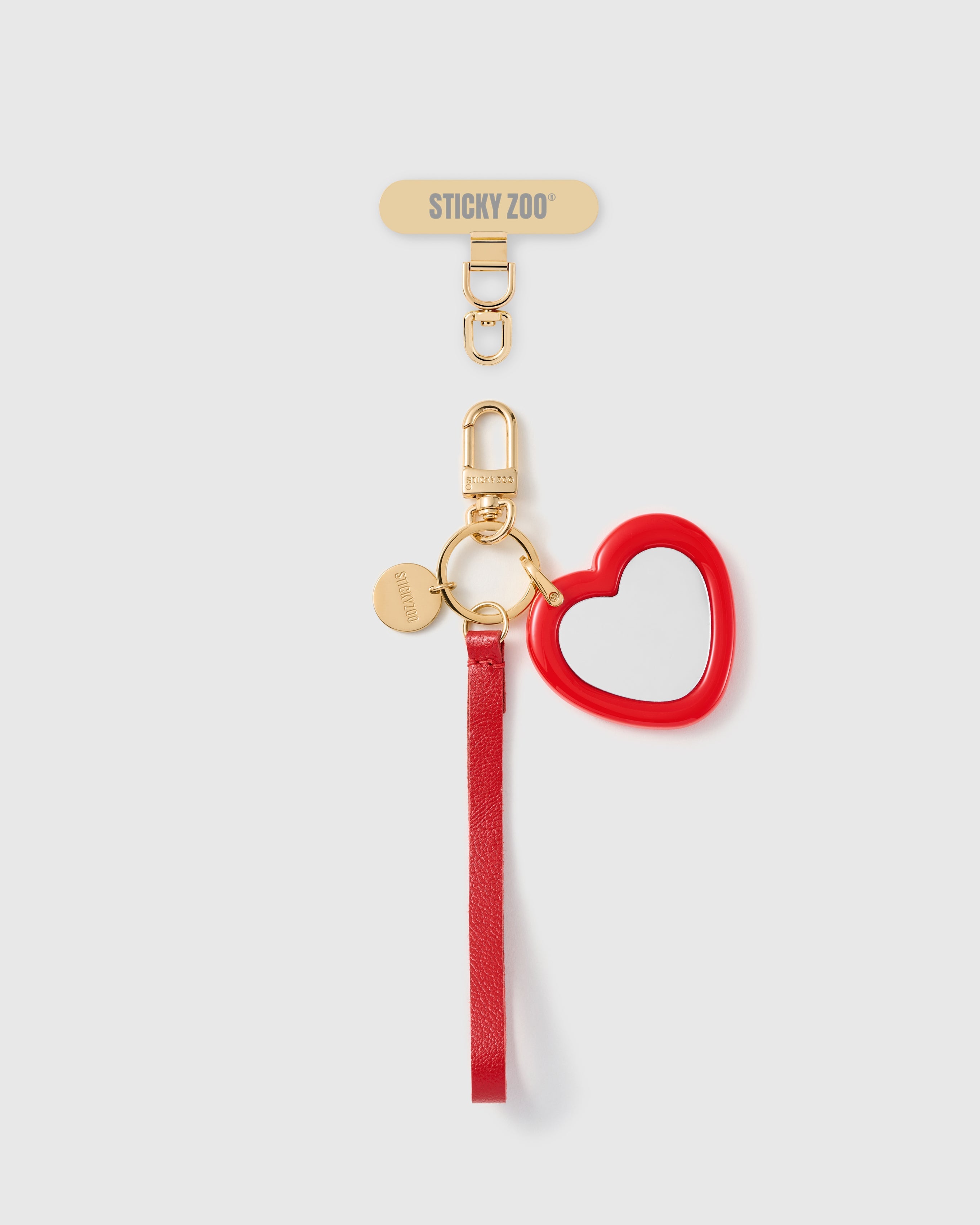 CRIMSON MIRROR HEART LEATHER PHONE STRAP