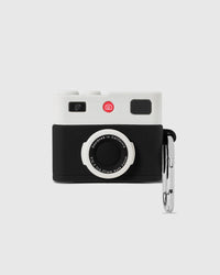 Black STICKYZOO Camera AirPods Case with white top and silver-tone clip