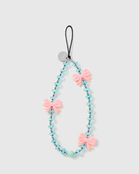 STICKYZOO Frost Bow phone strap laid flat: three glossy pink bows on faceted ice-blue beads with silver-tone rounds and one mint bead, black cord loop