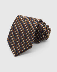 STICKYZOO Espresso Chevron Tie in espresso, cobalt and ivory silk, rolled to show espresso, cobalt, ivory and taupe micro chevrons across the blade.
