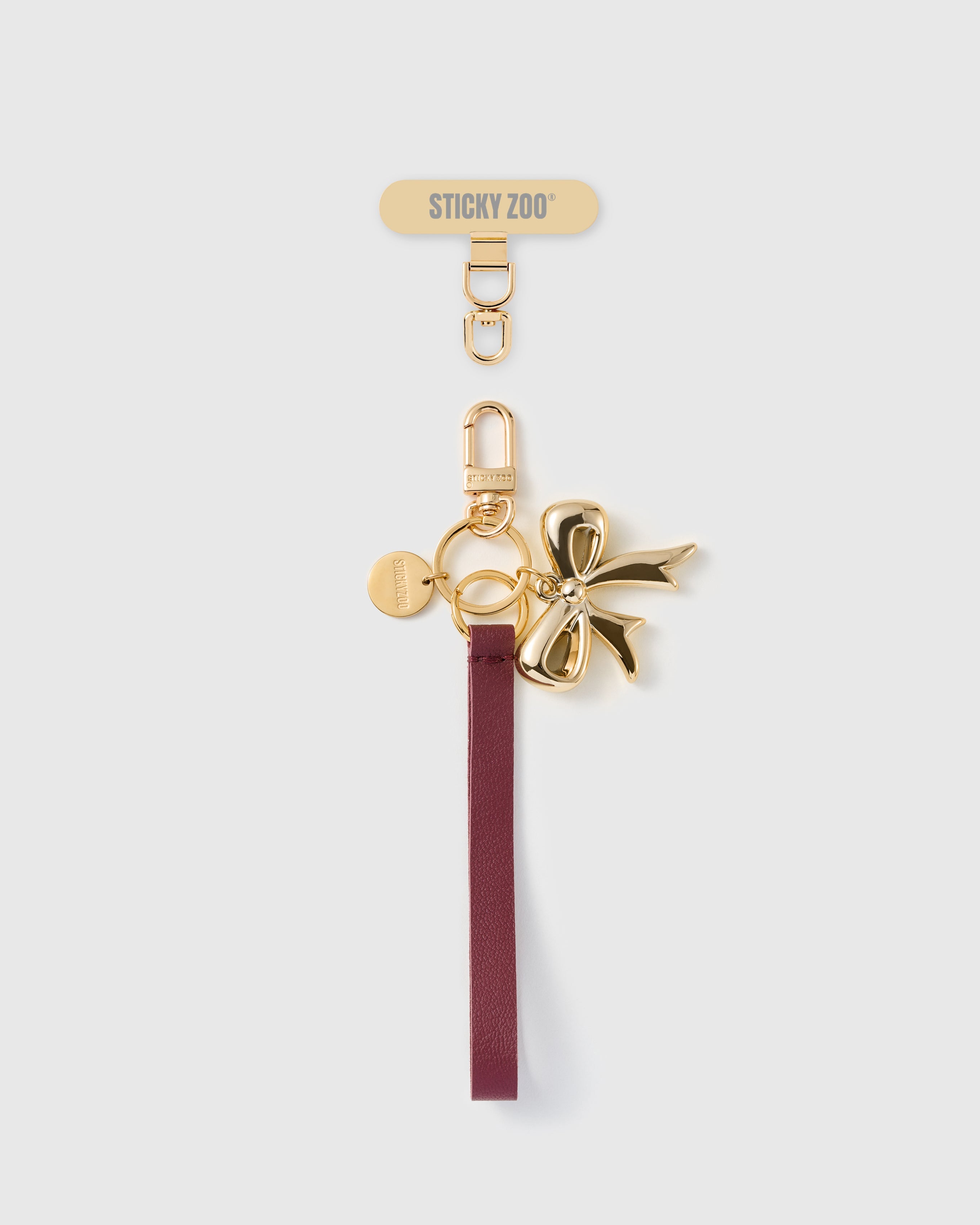 GOLDEN BOW LEATHER PHONE STRAP