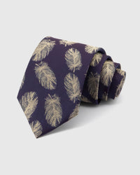 STICKYZOO Aubergine Gilded Feather Tie rolled on white, showing a deep aubergine ground scattered with slender pale-gold feathers across the front blade.