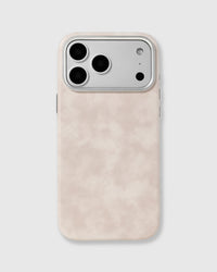 Cream Heritage Leather Case with a pale ivory-cream textured vegan leather surface and raised metal camera edge