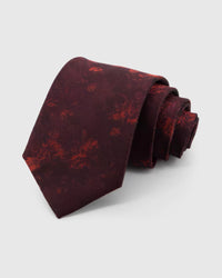 STICKYZOO Garnet Shadow Bloom Tie in garnet and claret silk, rolled to show garnet ground with tonal ember shadow blooms across the blade.