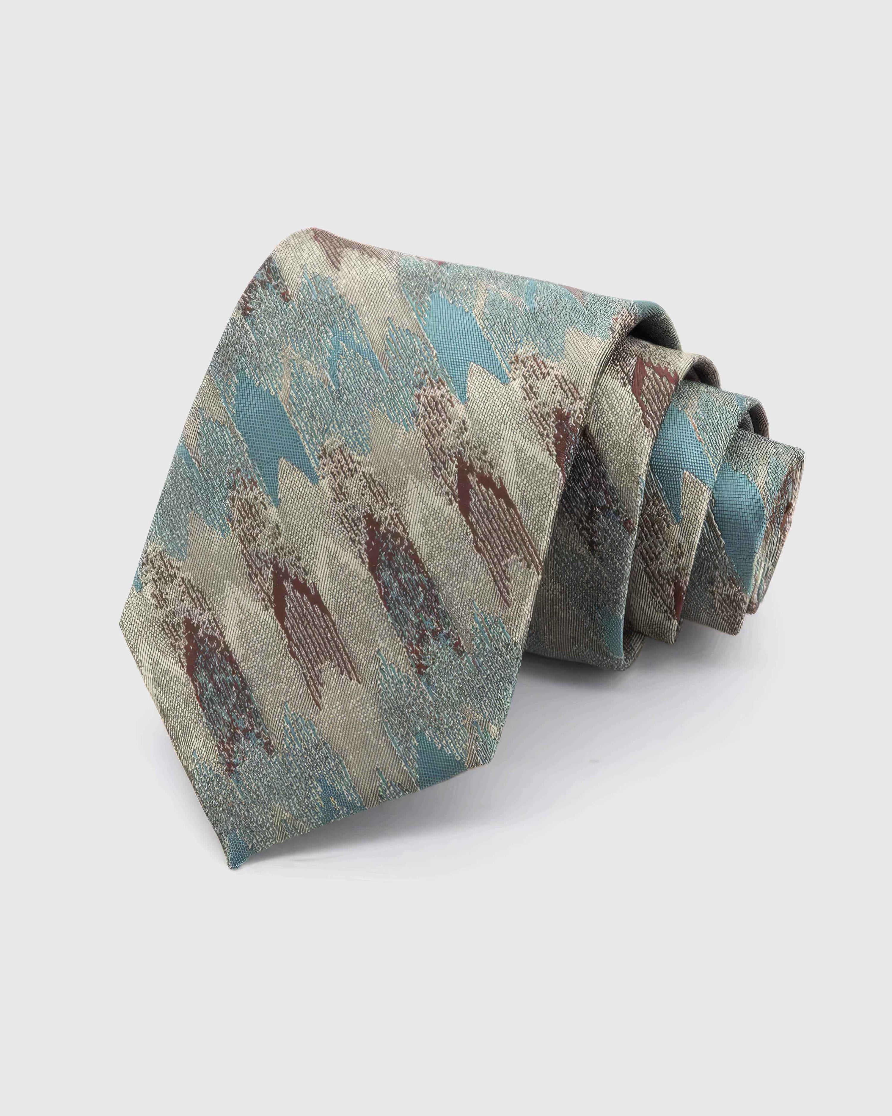 STICKYZOO Sage Brushwork Tie in sage, seafoam and ivory silk, rolled to show sage, aqua, ivory and umber abstract brushwork across the blade.