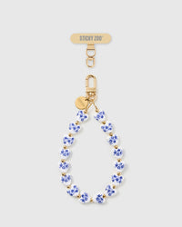 Handmade porcelain heart beaded phone strap by STICKYZOO with 18K gold-plated engraved hardware