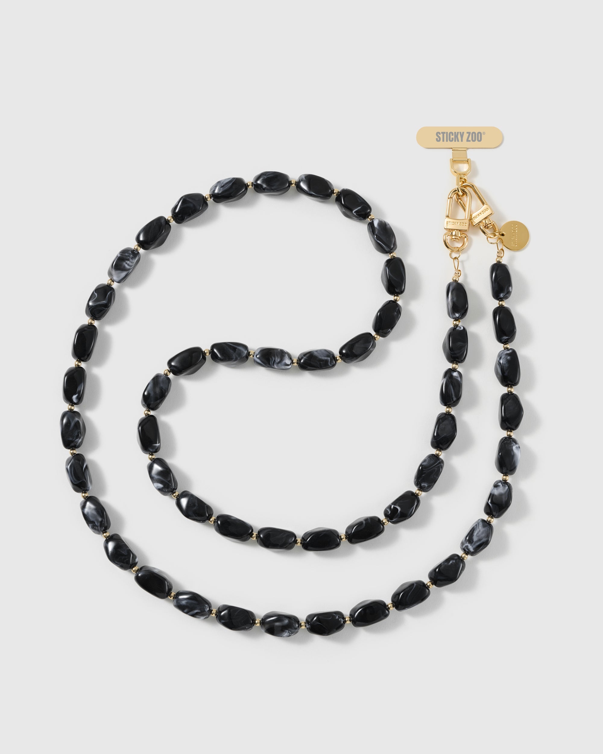 NOIR ORBIT CROSS-BODY PHONE STRAP