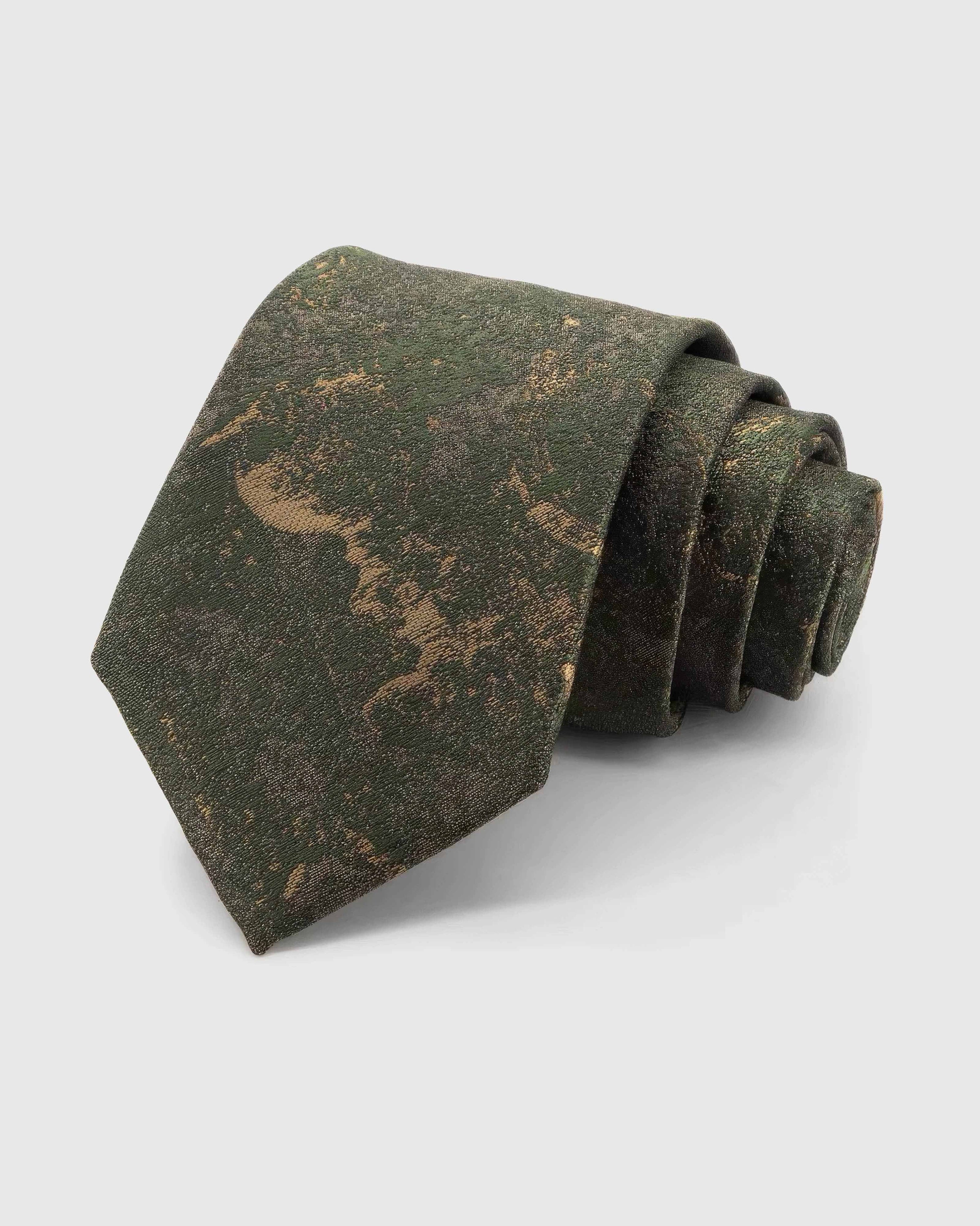 STICKYZOO Forest Patina Tie in forest and olive silk, rolled to show forest and olive abstract patina with golden forms across the blade.