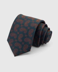 STICKYZOO Petrol Copper Paisley Tie rolled on white, showing a deep petrol ground covered in a fine copper-outline paisley repeat across the front blade.