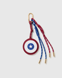 STICKYZOO Star Shield Stack Charm with stitched star motif and red and blue knotted cords