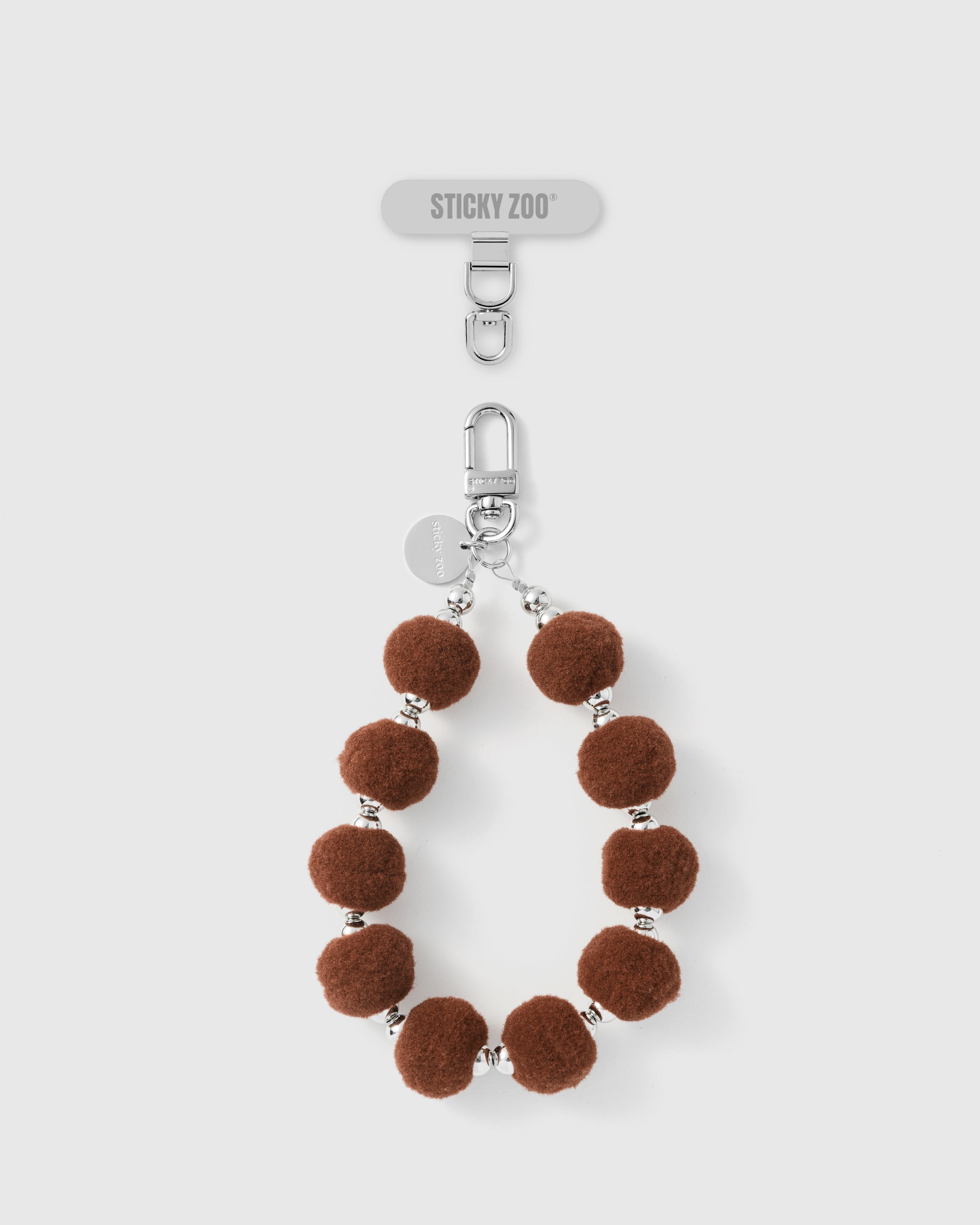 BROWN POM PHONE STRAP