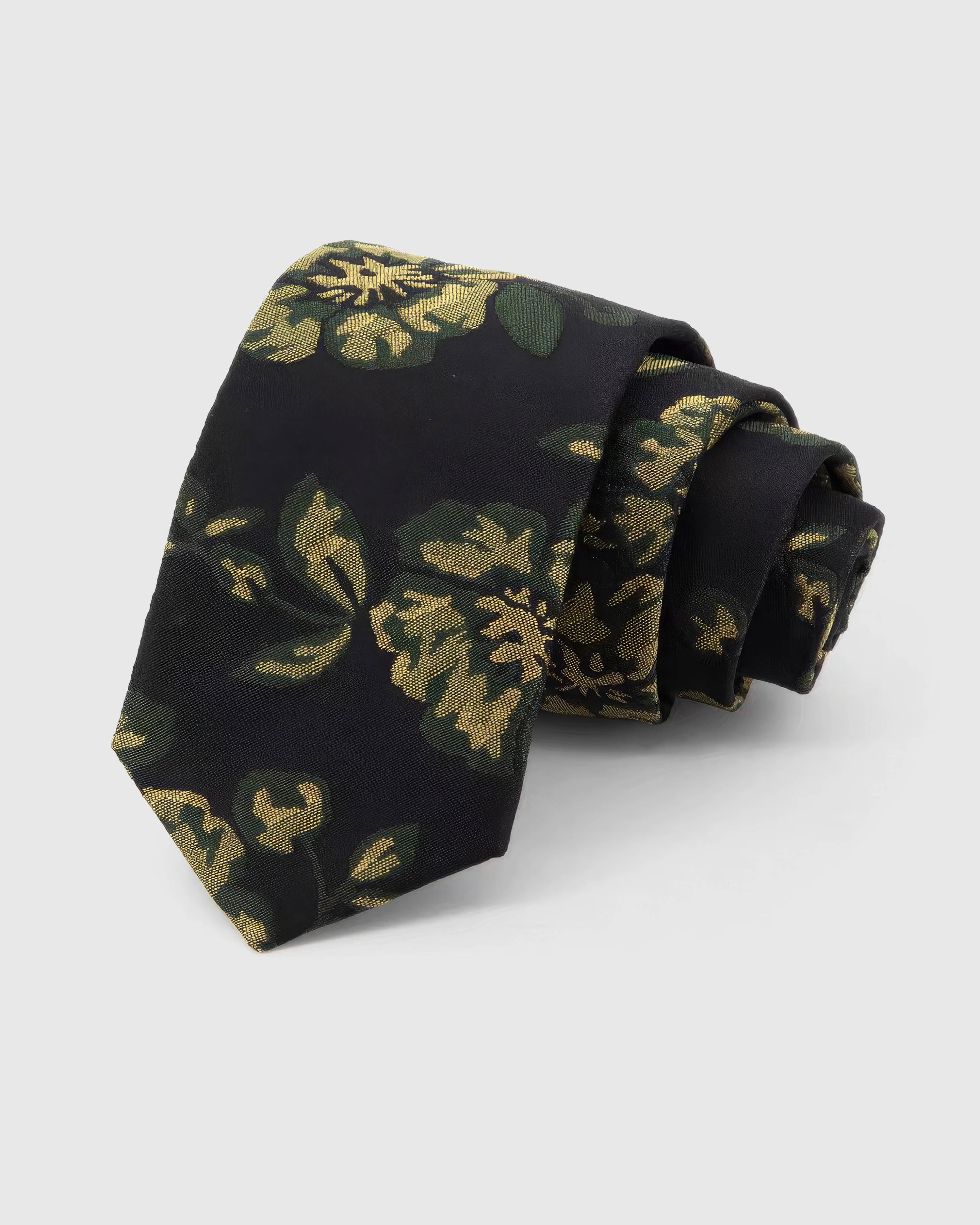 STICKYZOO Noir Golden Rose Tie rolled on white, showing a noir ground with large golden roses and deep-green botanical leaves across the front blade.