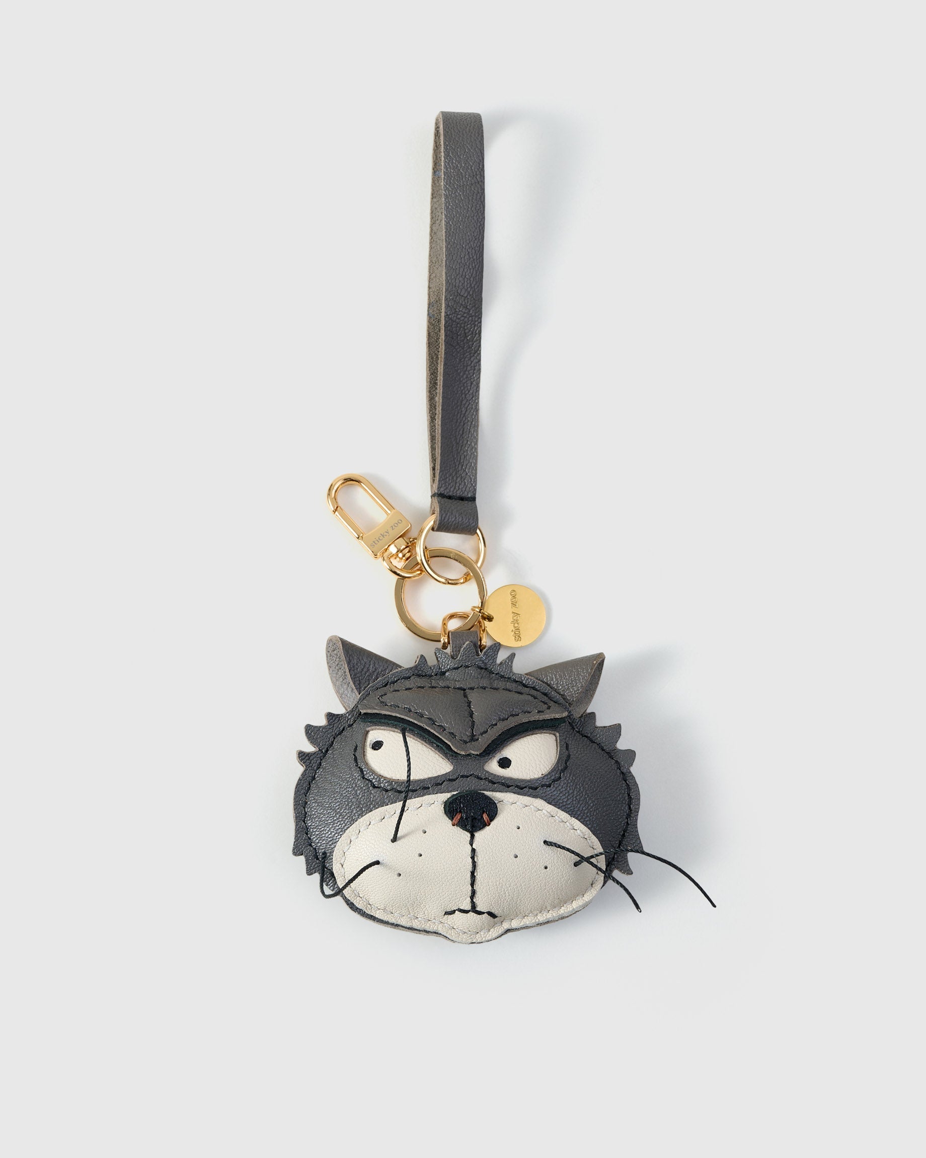 Grump cat on an 18K gold-plated keychain clip with engraved STICKYZOO disc — clips to keys, bags or backpacks.