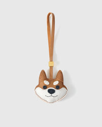 Orange Tokyo Shiba charm handmade from French Alran genuine goatskin and French suede — real full-grain leather from Tarn, since 1903. 3 days of hand-cutting, hand-stitching, hand-layering. Arrives in luxury gift packaging. Designed in Amsterdam.