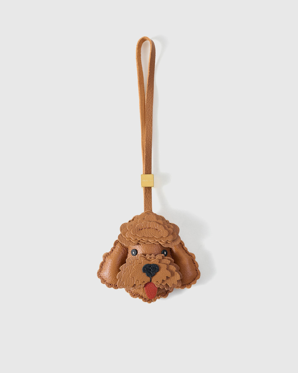Handmade Poodle leather bag charm with engraved 18K gold-plated cube hardware — French Alran goatskin, 3-day artisan build.