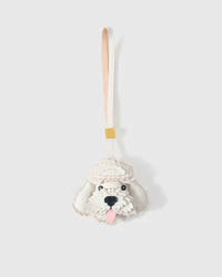 Handmade Poodle leather bag charm — full-grain French Alran goatskin with visible hand-stitched edges. STICKYZOO Amsterdam design.