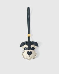 Black Schnauzer charm handmade from French Alran genuine goatskin and French suede — real full-grain leather from Tarn, since 1903. 3 days of hand-cutting, hand-stitching, hand-layering. Arrives in luxury gift packaging. Designed in Amsterdam.