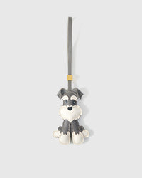 The urban schnauzer charm is made from genuine French Alran goatskin and French suede — real full-grain leather. Never vegan. Never synthetic. The difference shows.