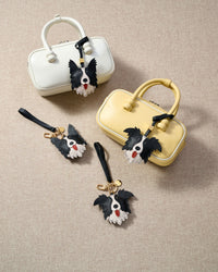 Every panel of the border collie charm is cut by hand and stitched through real French leather. Layered slowly for depth — no prints, no stamps.