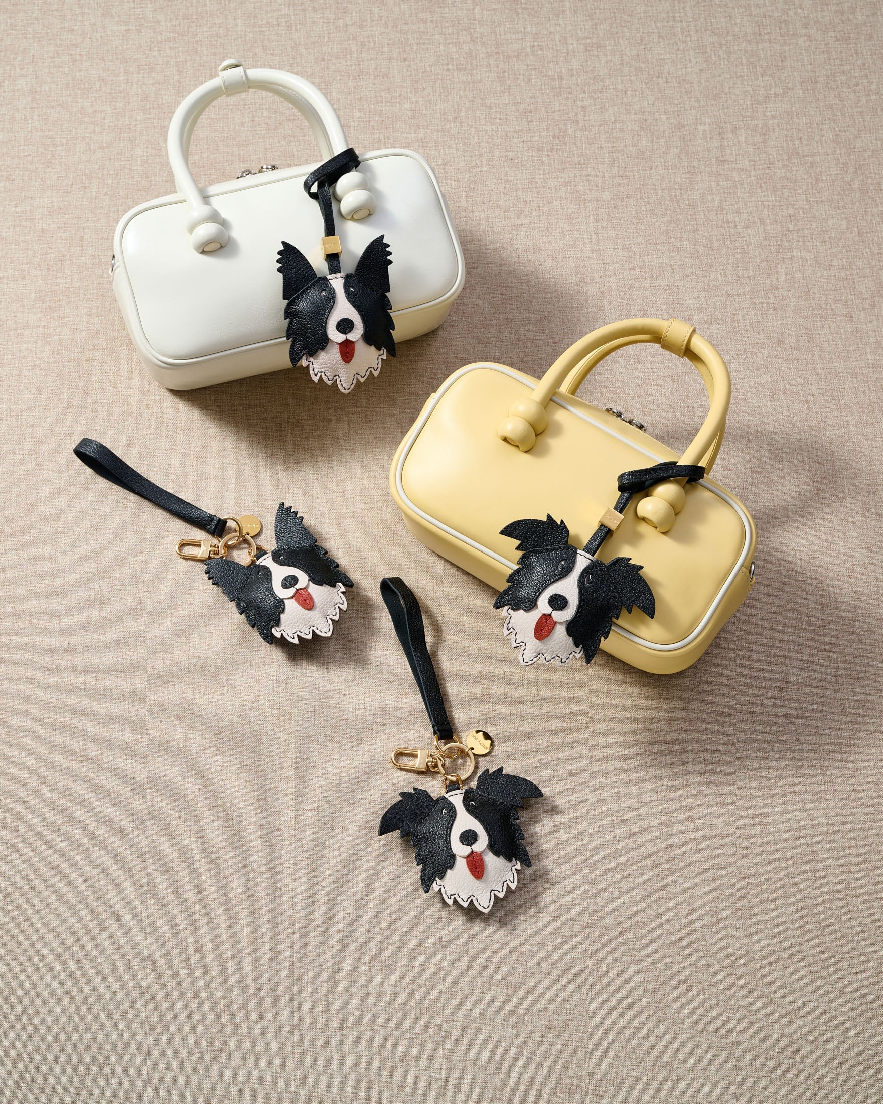 Every panel of the border collie charm is cut by hand and stitched through real French leather. Layered slowly for depth — no prints, no stamps.