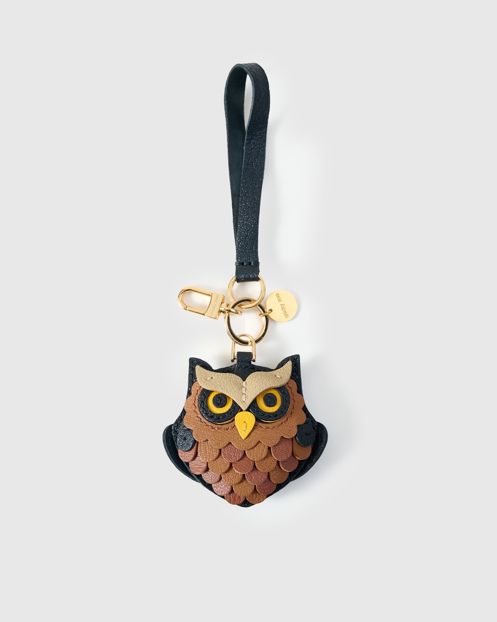 Owl charm on an 18K gold-plated keychain clip with engraved STICKYZOO disc — clips to keys, bags or backpacks.
