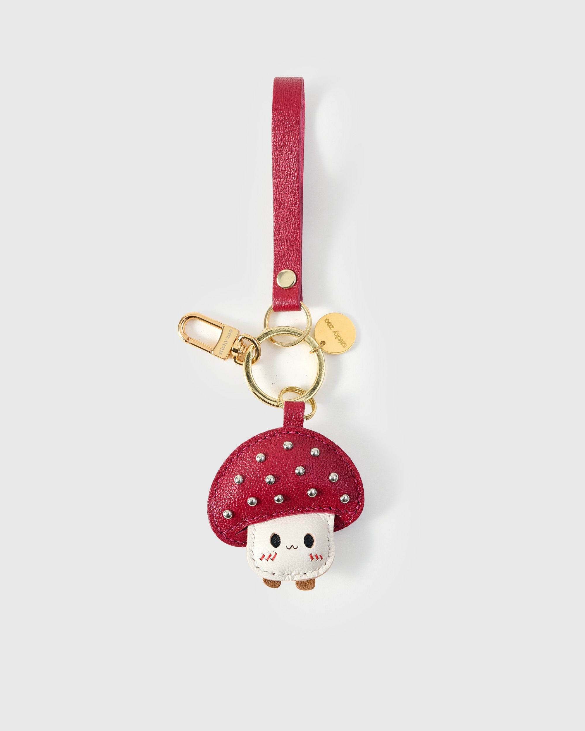 STICKYZOO Mushroom Charm in red with silver studs French Alran goatskin. Hand-cut, hand-stitched. Designed in Amsterdam.