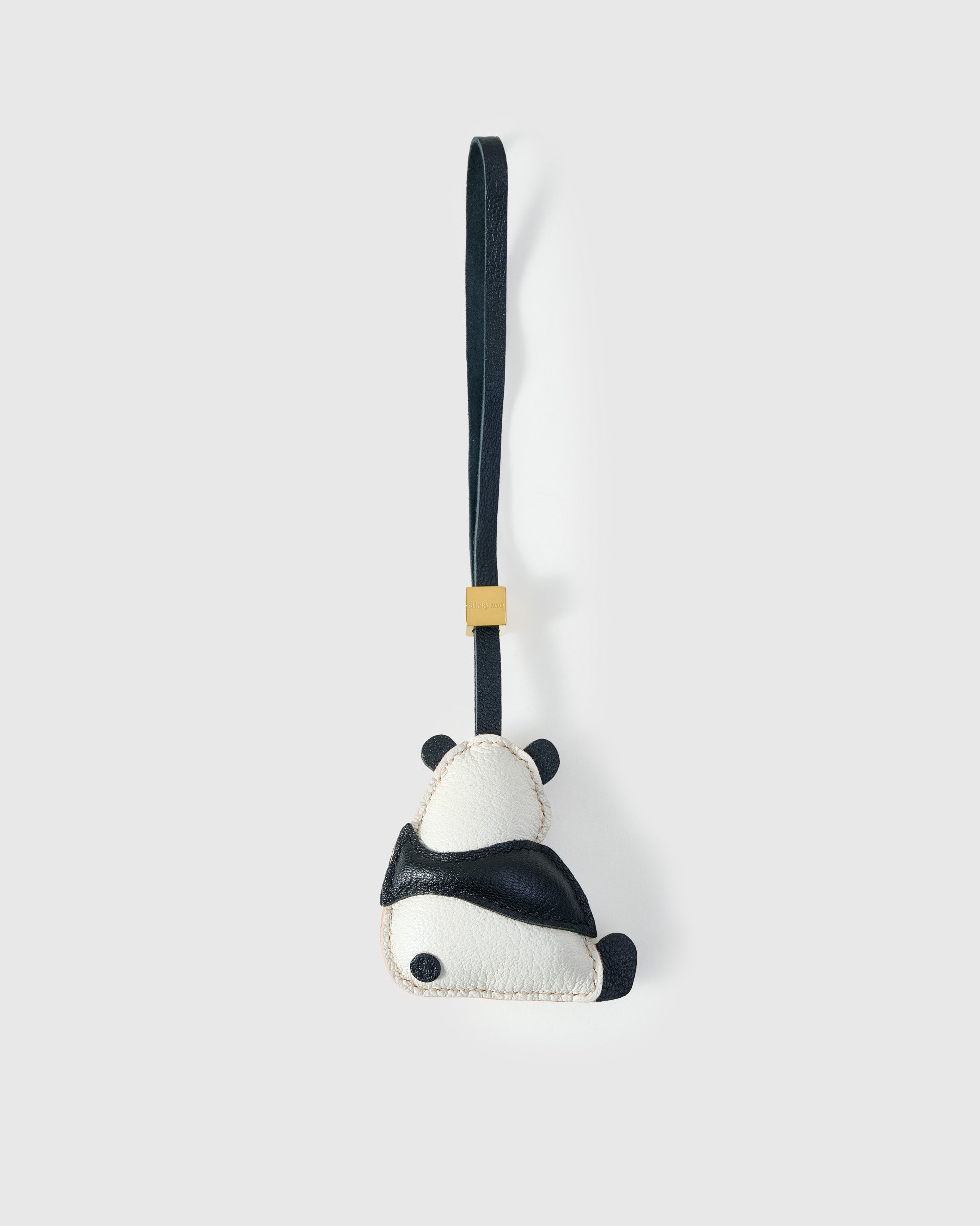 PANDA CHARM charm handmade from French Alran genuine goatskin — A panda, sitting, seen from behind. White leather back,. Three days by hand. Arrives in luxury gift packaging. Designed in Amsterdam.