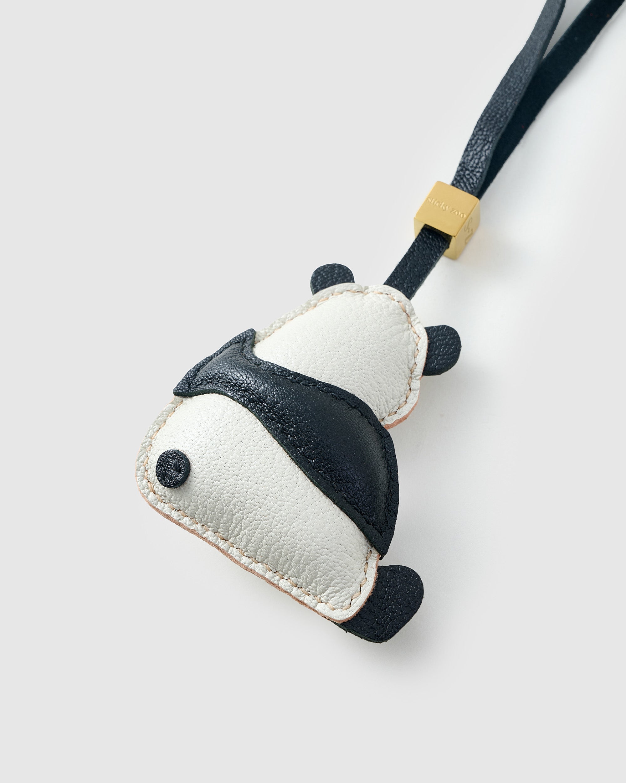 PANDA CHARM on an 18K gold-plated keychain clip with engraved STICKYZOO disc — clips to keys, bags or backpacks.