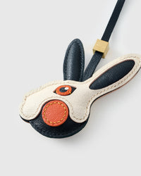 RABBIT CHARM on an 18K gold-plated keychain clip with engraved STICKYZOO disc — clips to keys, bags or backpacks.