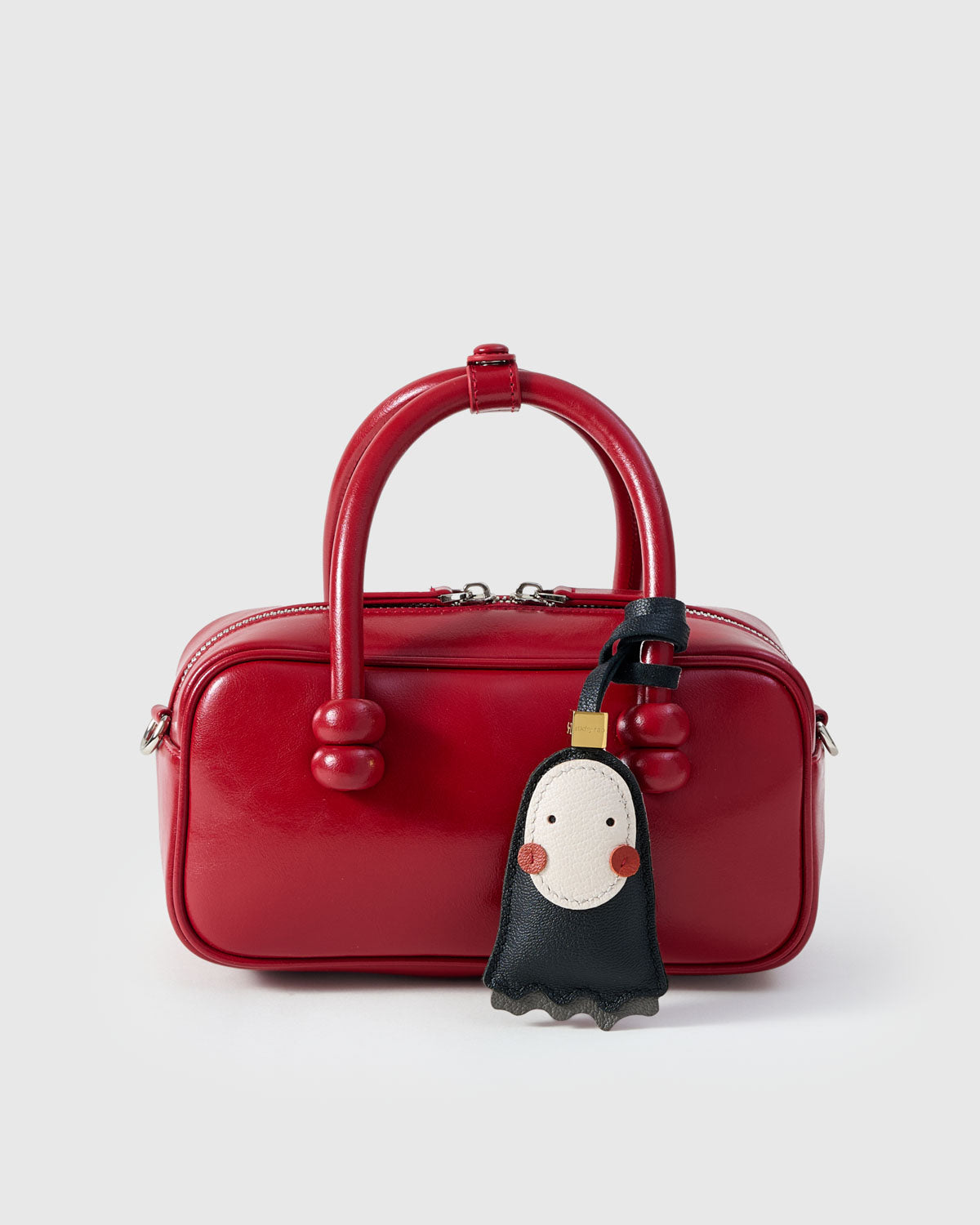 NO FACE CHARM