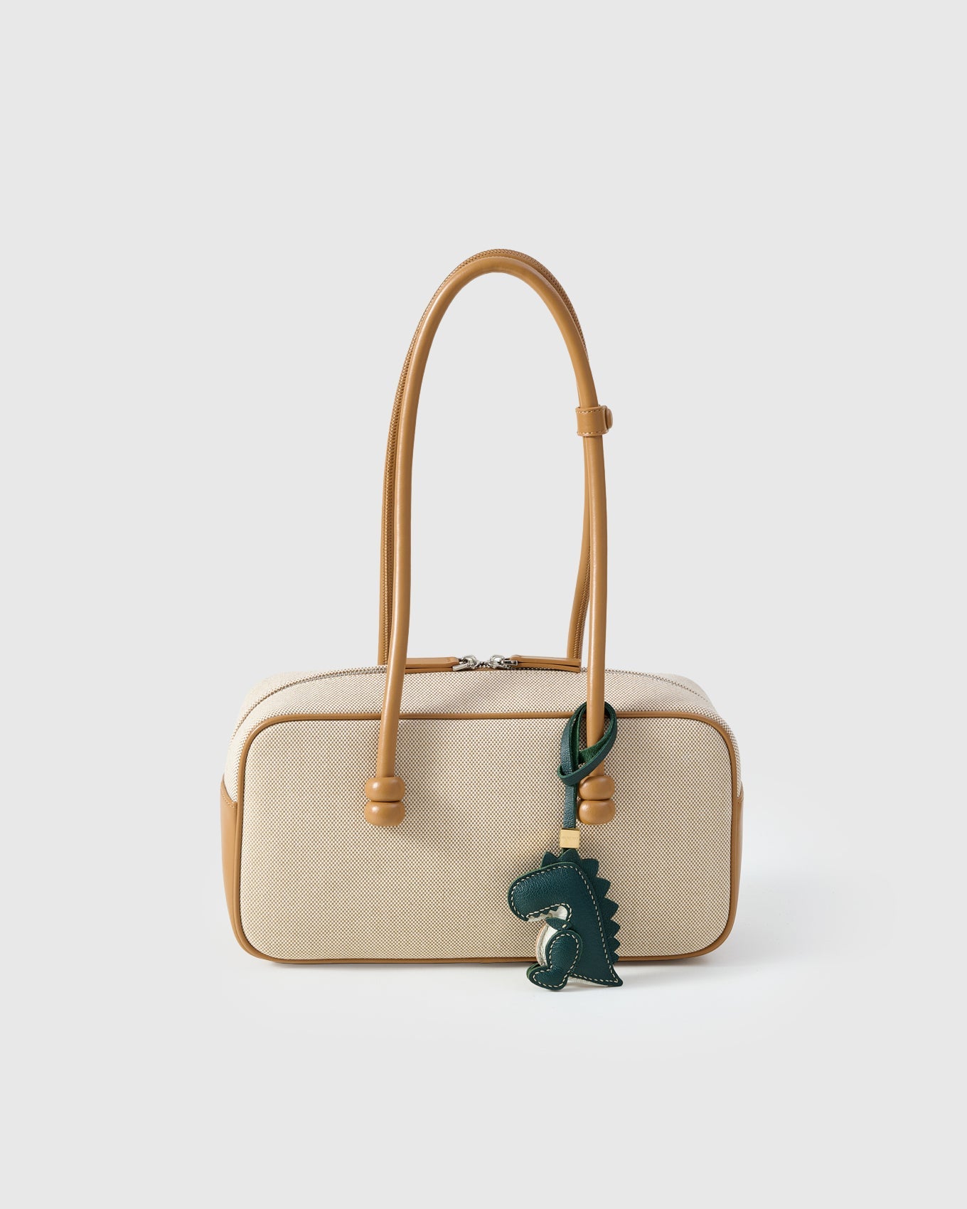 Green dinosaur — loved by thousands of buyers. Real French leather, 3 days by hand.