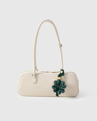 STICKYZOO Lucky Clover Charm — hand-cut, hand-stitched padded heart-shaped petals with contrast stitching in French Alran goatskin. Designed in Amsterdam.
