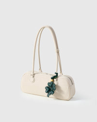 STICKYZOO Lucky Clover Charm with engraved gold hardware cube — handmade French Alran goatskin, forest green padded 3D.