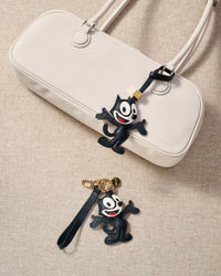 THE CAT CHARM