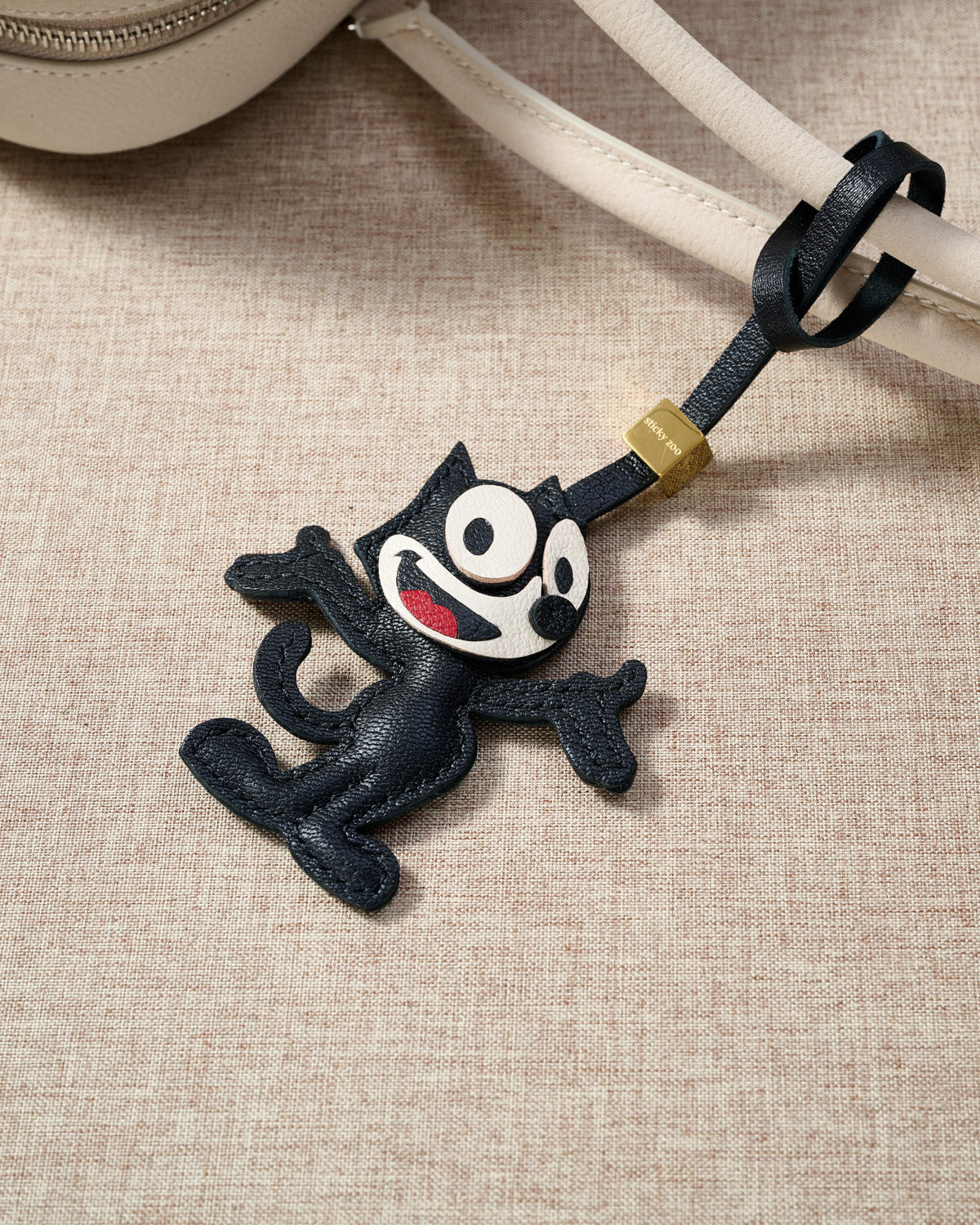 THE CAT CHARM