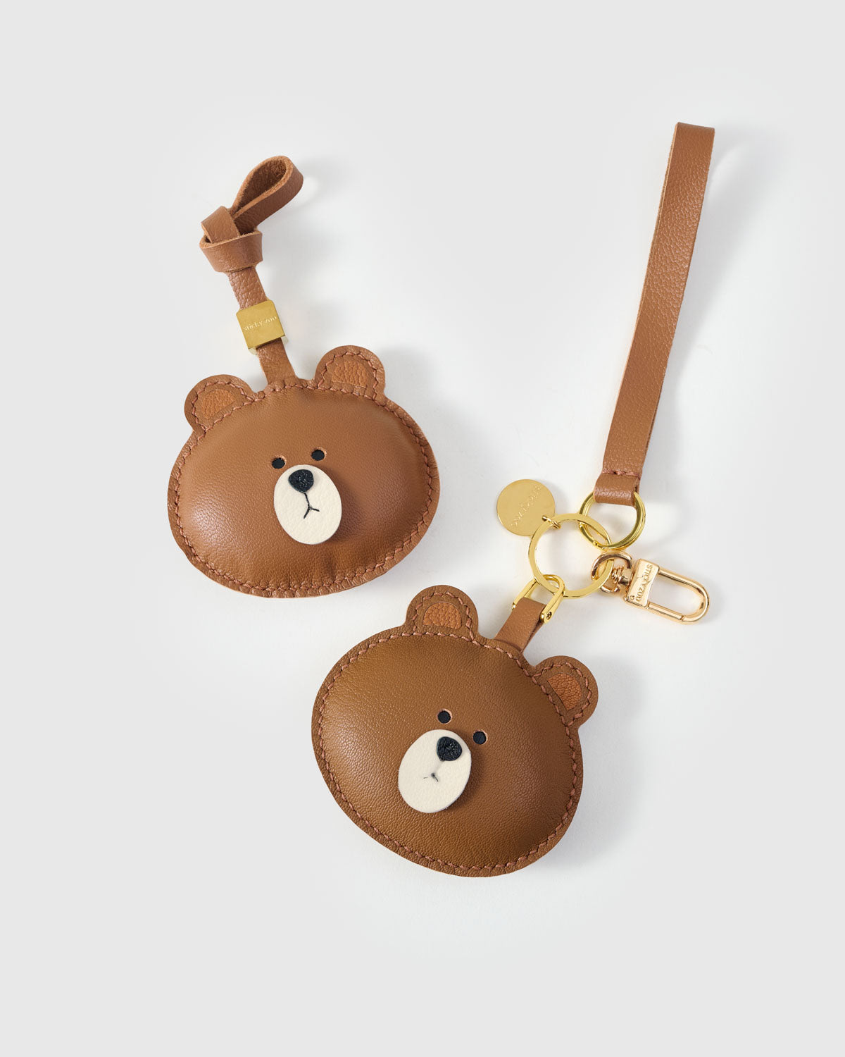 CUDDLY BEAR CHARM on an 18K gold-plated keychain clip with engraved STICKYZOO disc — clips to keys, bags or backpacks.