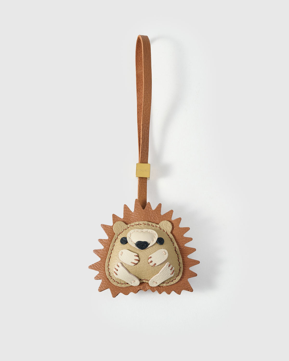 HEDGEHOG CHARM charm handmade from French Alran genuine goatskin — A hedgehog, curled slightly, with spiked leather quills and. Three days by hand. Arrives in luxury gift packaging. Designed in Amsterdam.