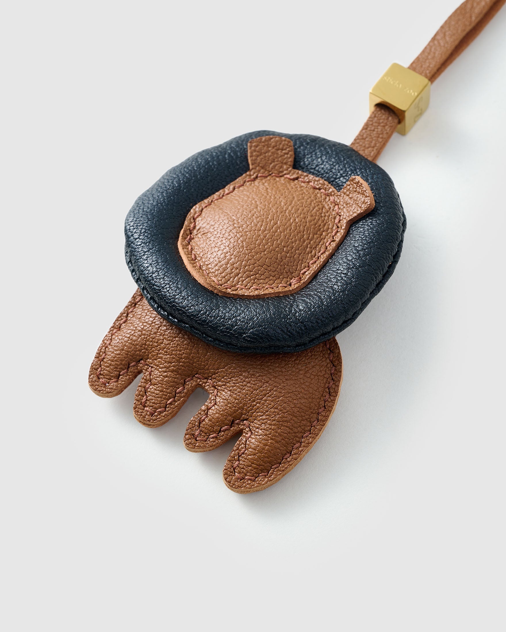 LION CHARM