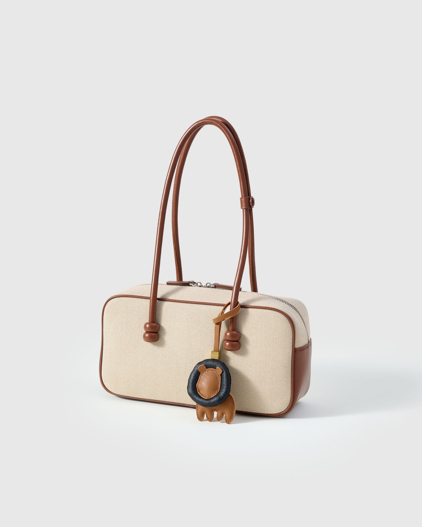 LION CHARM — French Alran leather from Tarn, France, founded 1903, Entreprise du Patrimoine Vivant.