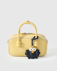 Black Hootie charm on a bag, side angle — rated 4.9★ by thousands of buyers. Real French Alran leather, 3 days by hand.