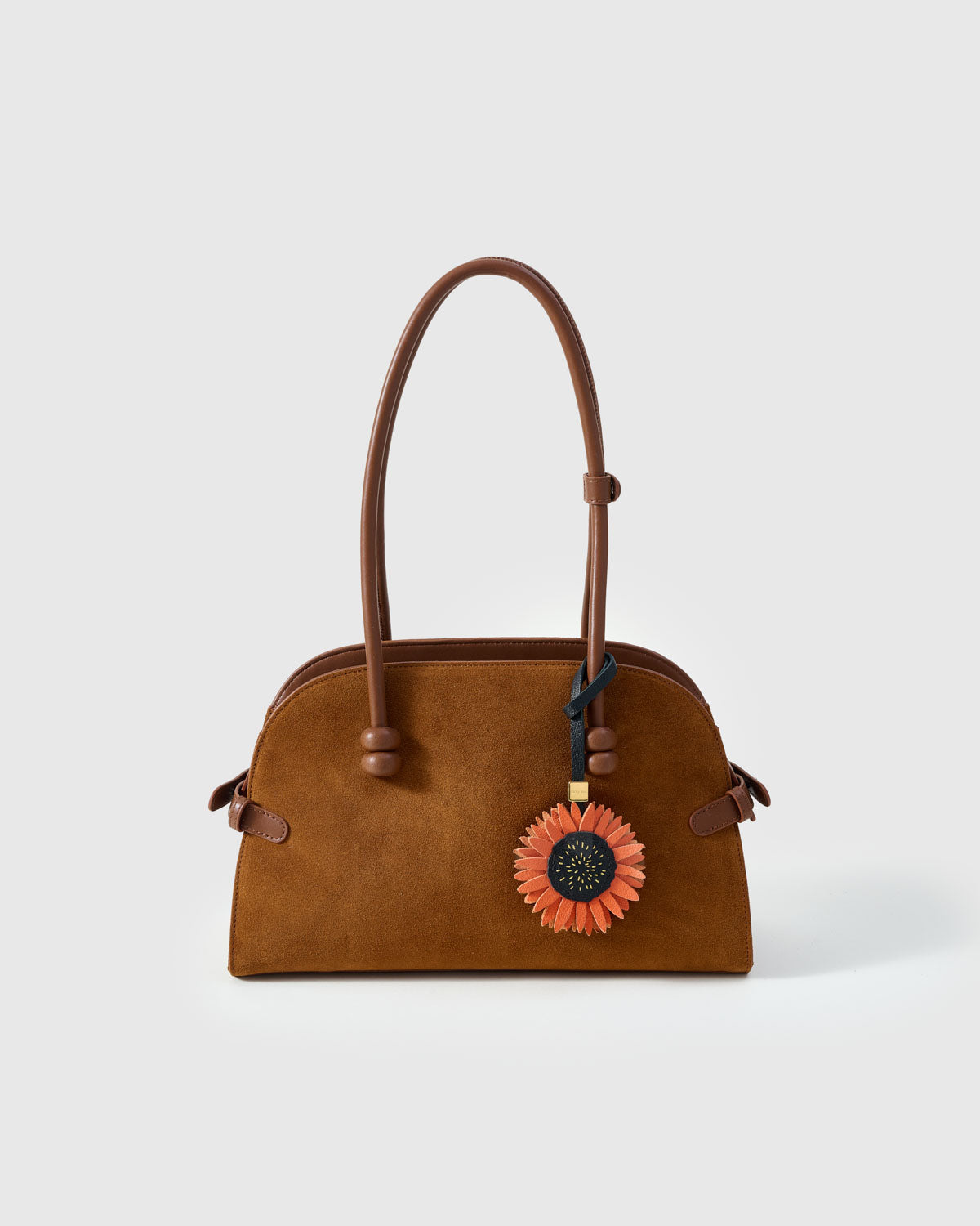 STICKYZOO Sunflower Charm in rust orange over dark navy — handmade French Alran goatskin with 18K gold-plated hardware. Arrives gift-ready.