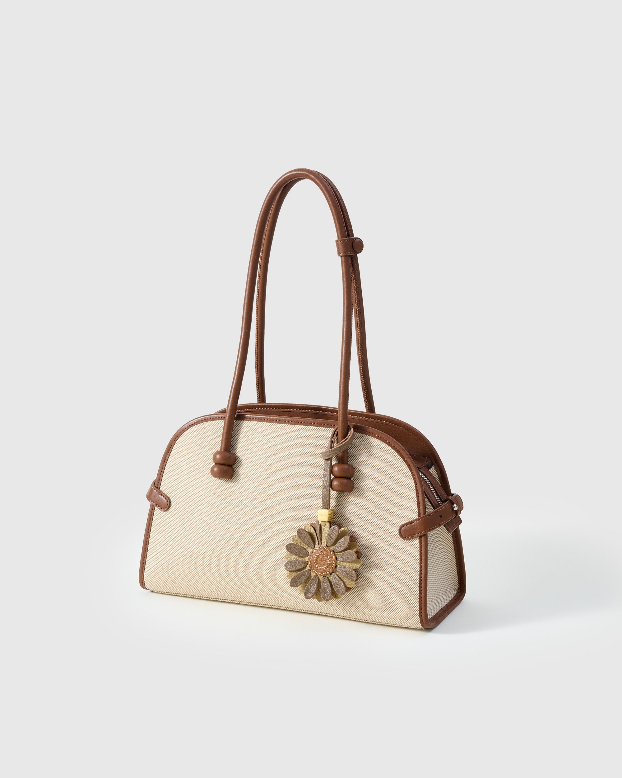 STICKYZOO Daisy Charm in taupe and olive — handmade French Alran goatskin with 18K gold-plated hardware. Arrives gift-ready.
