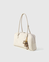 STICKYZOO Twin Flowers Charm — hand-layered French Alran goatskin, twin five-petal blooms on gold keychain. Designed in Amsterdam.